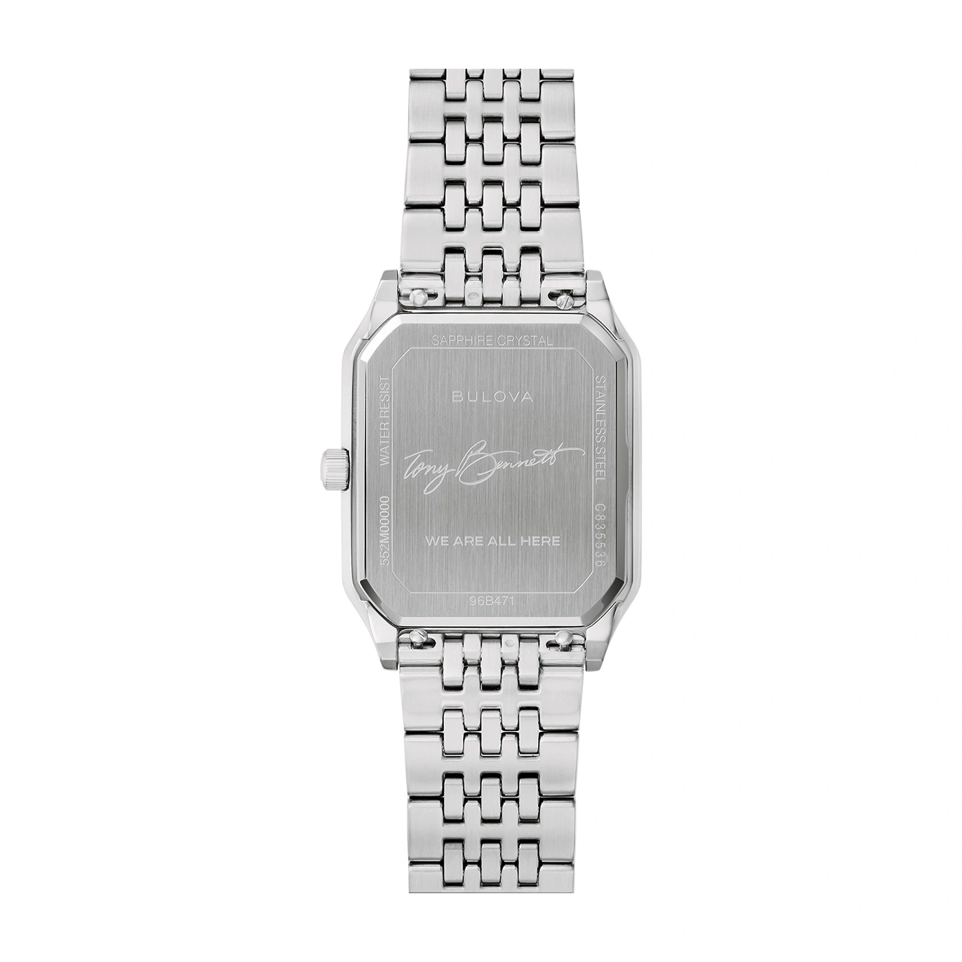Achterkant van een zilveren horloge met gravure, tekst en handtekening van Tony Bennett.