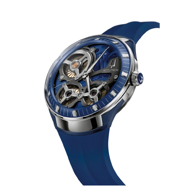 Blauw Accutron horloge met transparante wijzerplaat en close-up van het uurwerk.